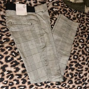 Ankle length slacks.